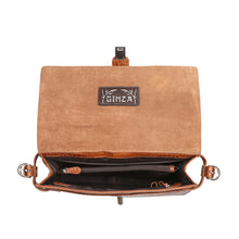 Load image into Gallery viewer, Interior view of tan Hidesign shoulder bag showing suede flap, compartments, zippers, & key holder.