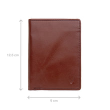 Load image into Gallery viewer, A closed view of a tan leather wallet is shown with its dimensions, 12.5 cm by 9 cm from Hidesign.