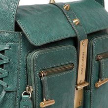 Load image into Gallery viewer, Close-up of green leather shoulder bag showing front zip pockets, studs, and Hidesign clasp.