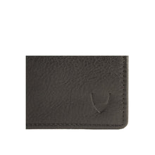 Load image into Gallery viewer, A close-up of a man's black leather wallet's corner, showing the debossed logo and fine stitching.