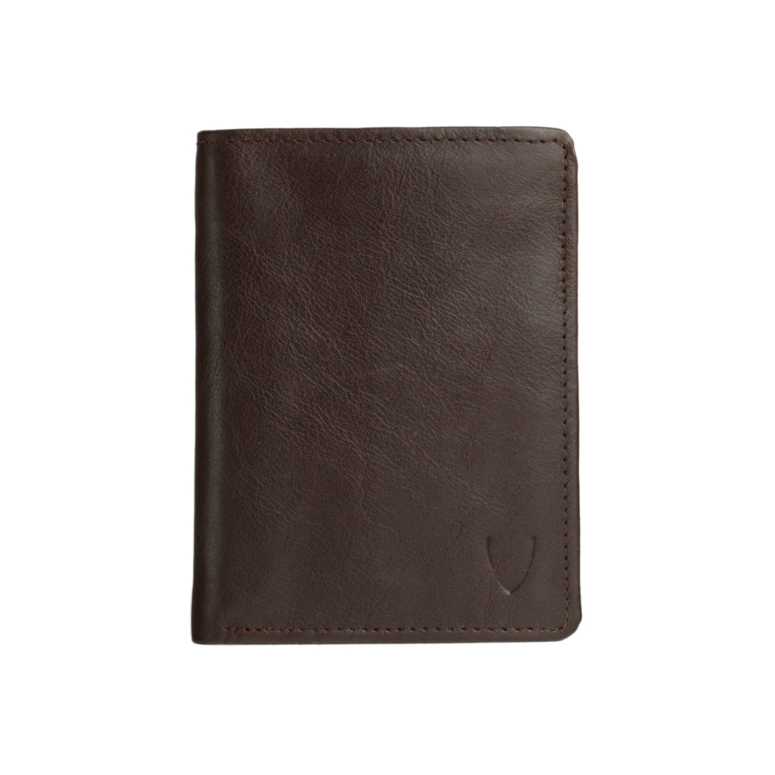 A dark brown, textured leather men's bi-fold wallet, kept against a white background by Hidesign.